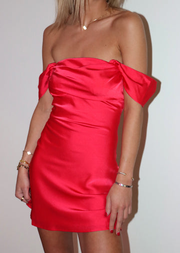 Red mini dress, satin material. Off the shoulder short sleeves.