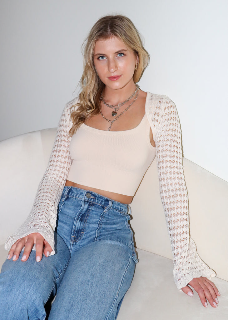 White extreme cropped fit cardigan shrug. Crochet knit. Bell sleeves.