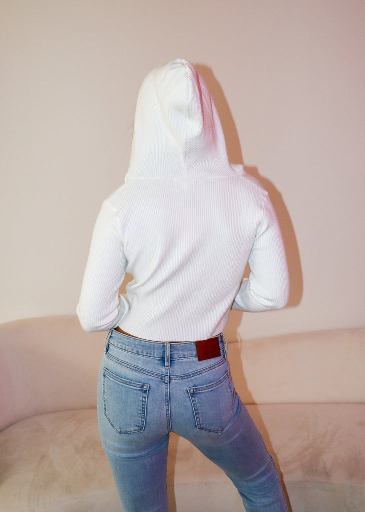 White ribbed long sleeve cropped women's zip up sweater hoodie. Wear to class or for casual day-to-day lounge wear.