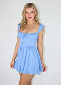 Blue mini dress, features bustier top, flowy hem and zipper back.