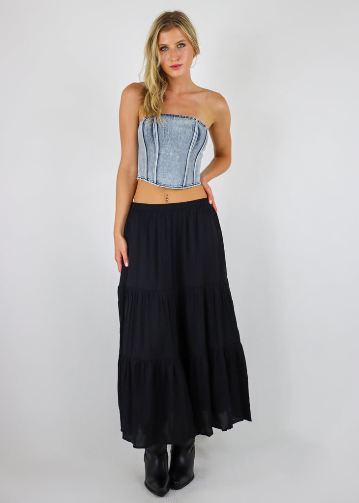 Tiered maxi skirt featuring side pockets. 
