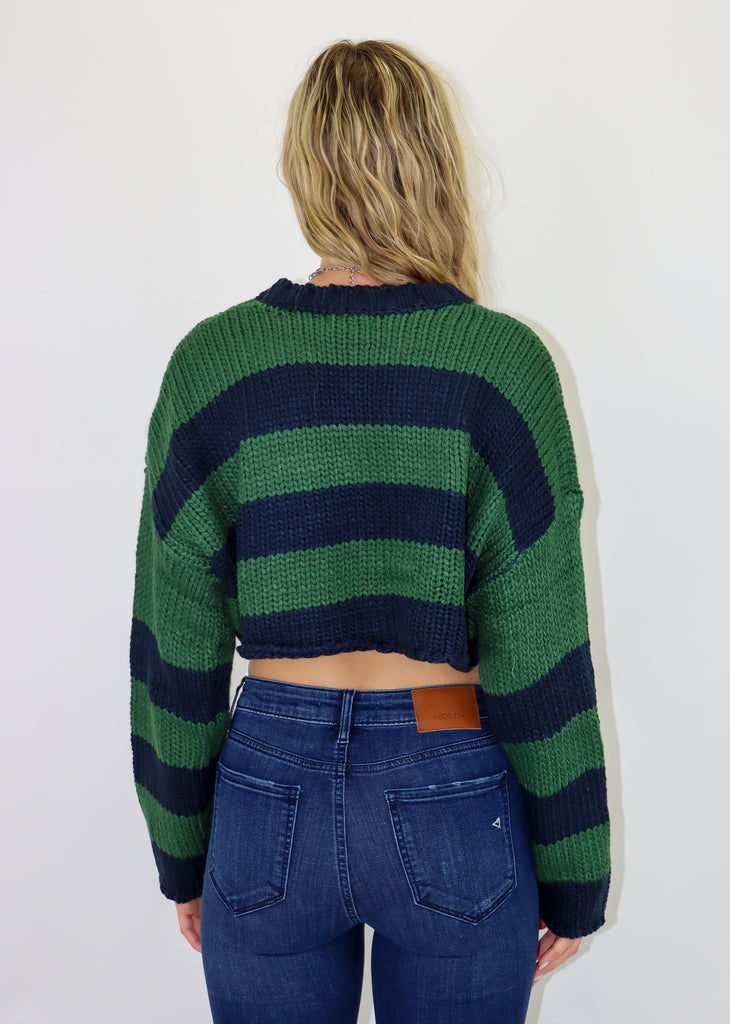 Blue and navy stripped knit sweater. Cropped fit.
