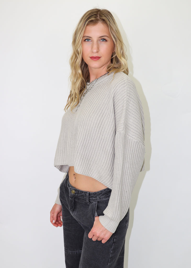Cropped sweater, knit material