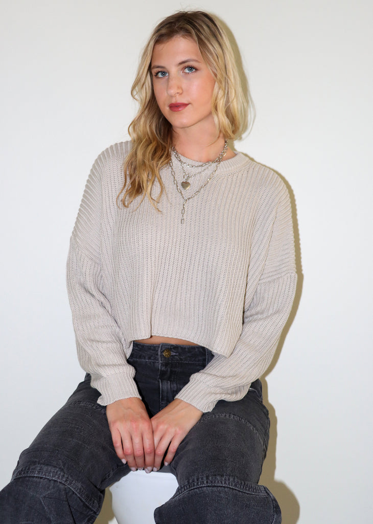 Cropped sweater, knit material