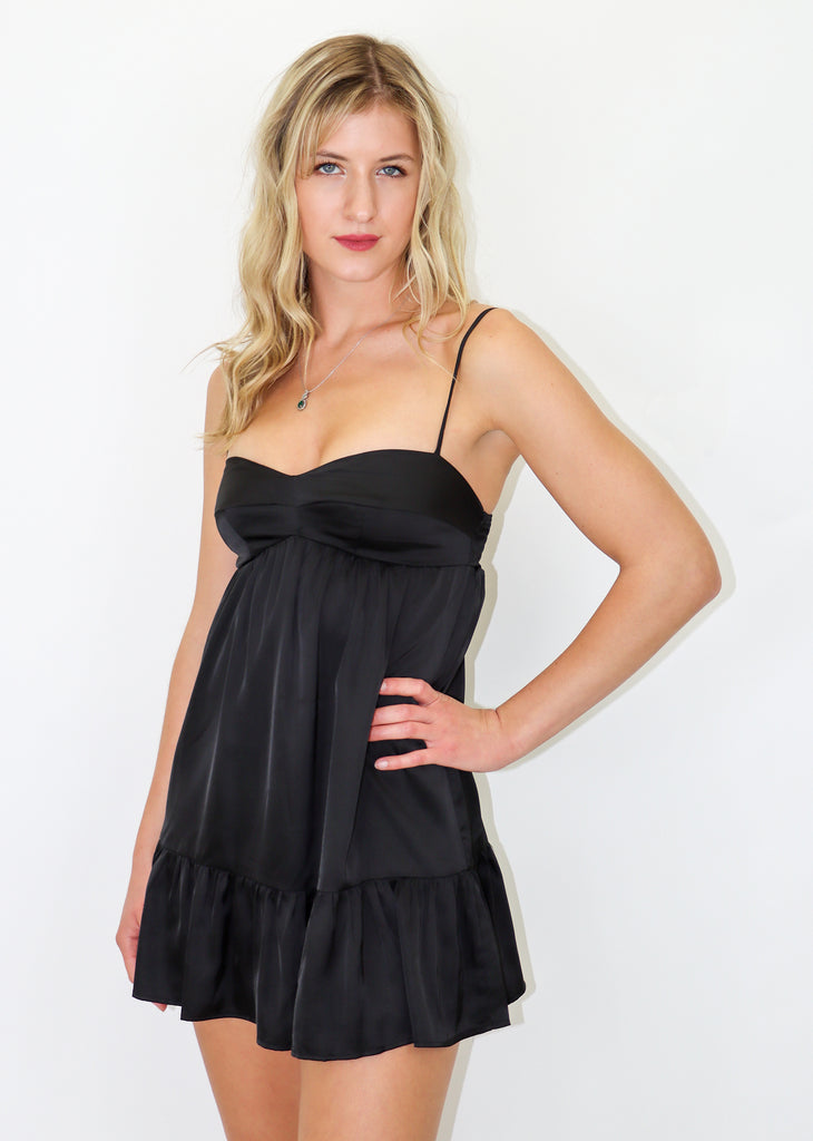 black satin baby doll dress with adjustable thin straps and ruffle detailing