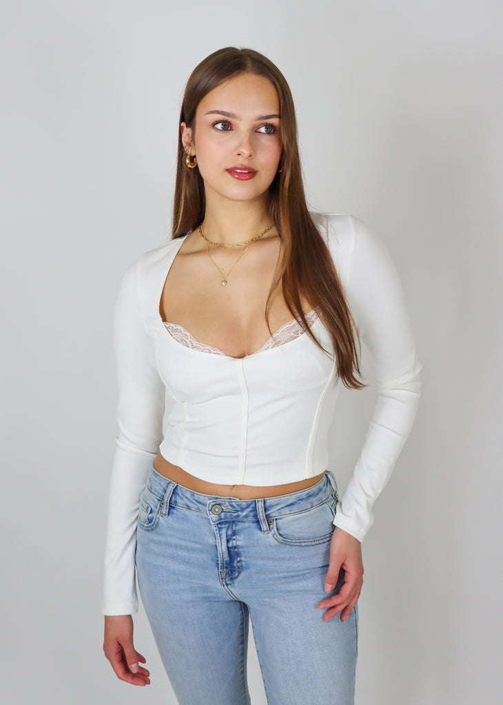 White long sleeve corset panel with lace trim crop top