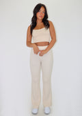 High waisted bell bottom off-white knit pants.
