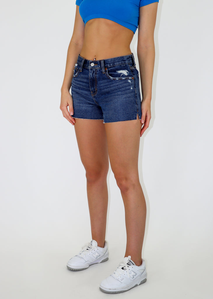 Dark wash high waisted denim shorts with pockets in front and back.