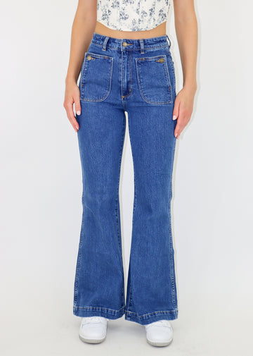 high waisted boot leg cut dark wash denim jeans with two front patch pockets