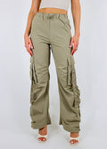 Cargo parachute pants, drawstring waistline, cargo pockets with belt buckle, ruched side detailing.