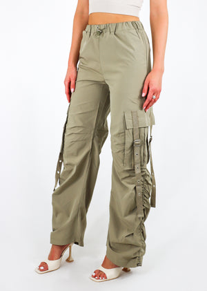 Cargo parachute pants, drawstring waistline, cargo pockets with belt buckle, ruched side detailing.