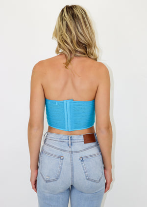 Mesh overlay blue corset crop top, strapless, corset boning, hook and eye back closures.