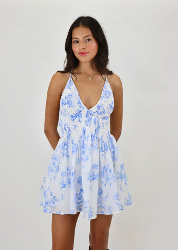 white blue floral smocked mini dress flowy v-neck summer dress