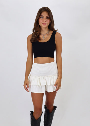 white skirt fitted waist with two ruffle tiers cream color built in shorts 