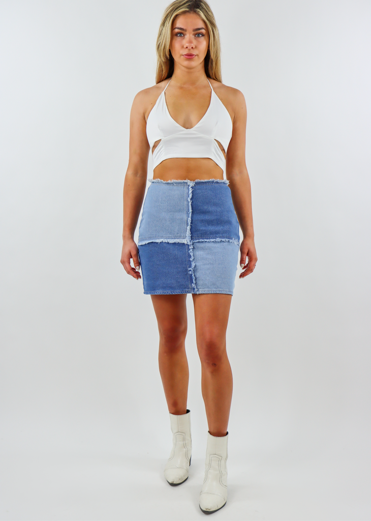 Light Wash and Medium Wash Denim Color Block Skirt with Zipper Closure and Fraying Along Front and Waistband