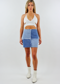 Light Wash and Medium Wash Denim Color Block Skirt with Zipper Closure and Fraying Along Front and Waistband