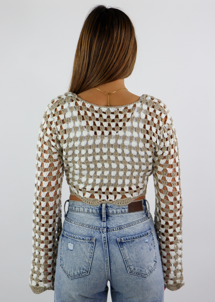 Women's brown and white checkered crochet cropped cardigan sweater with keyhole tie front and bell sleeves.