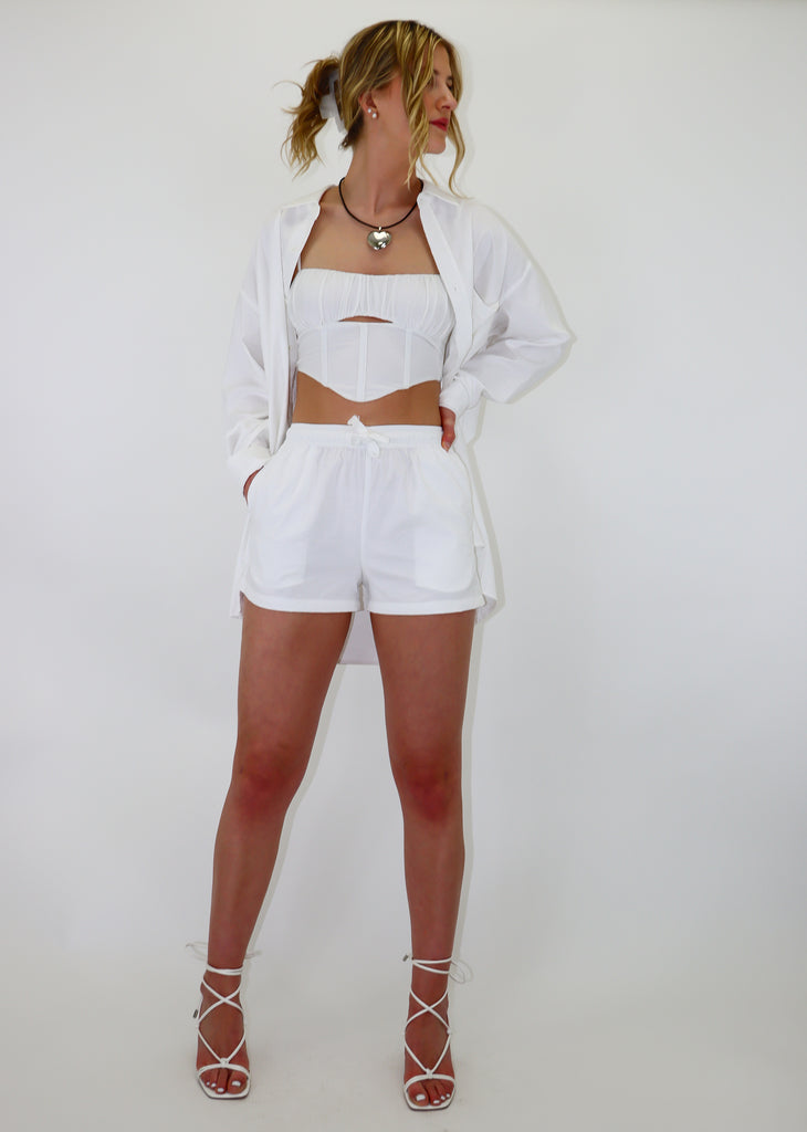 white long sleeve button up and shorts set oversized fit adjustable drawstring shorts spring summer transitional piece beach pool coverup neutral basics women's clothing
