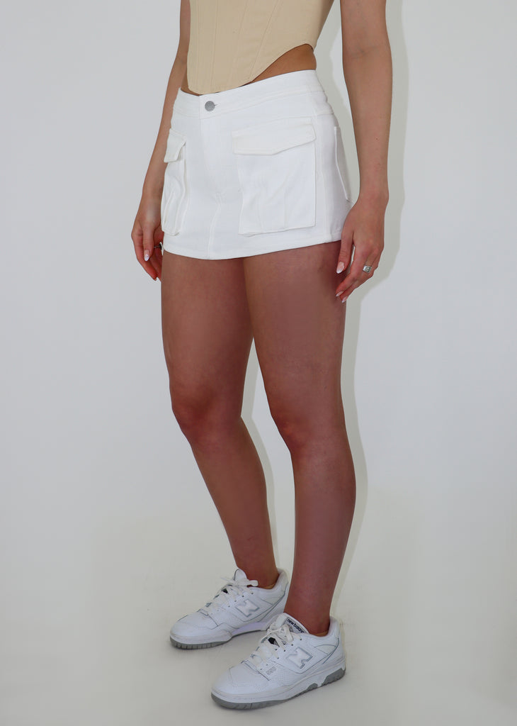 white cargo skort built in shorts in back skirt in front two front cargo pockets button closure mini skirt going out skirt casual day skirt festival season closet essentials neutral spring summer women's clothing