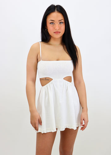 White mini dress straight neckline spaghetti strap side slits ruffled bottom