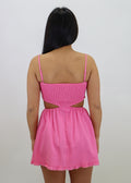 Pink mini dress straight neckline spaghetti strap side slits ruffled bottom