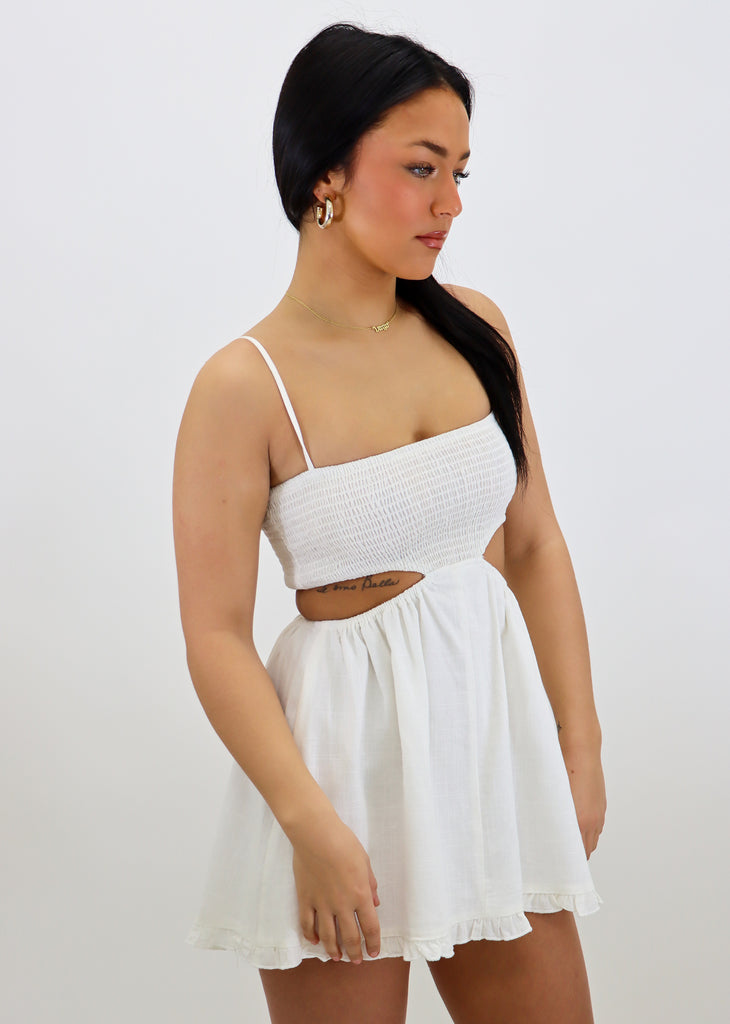 White mini dress straight neckline spaghetti strap side slits ruffled bottom